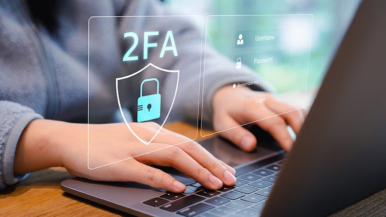Desk setup demonstrating secure login with two-factor authentication